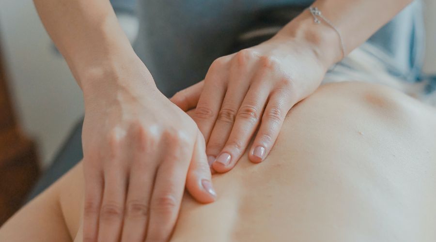 A person receiving chiropractic adjustment