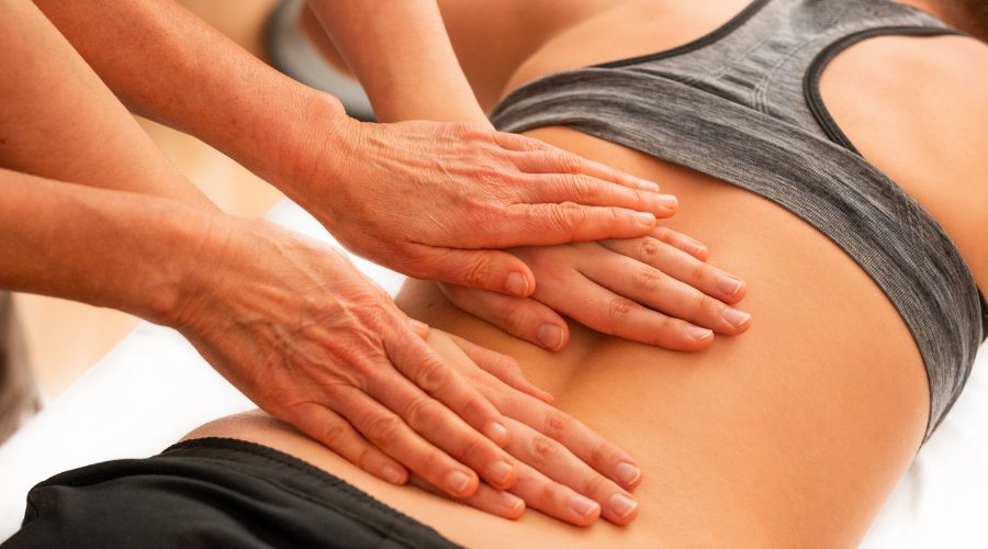 Woman receives chiropractic care.
